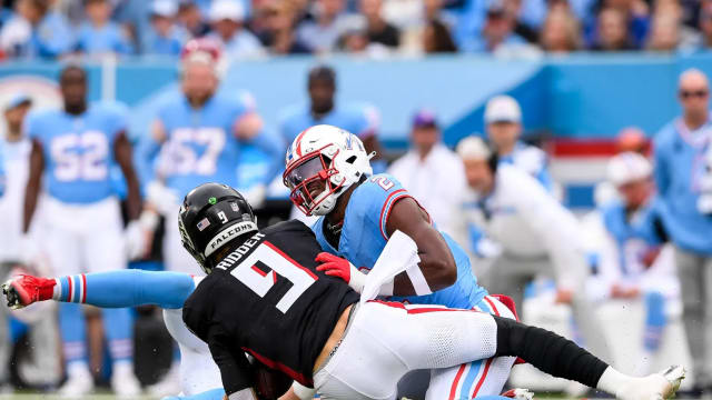 Oct 29, 2023; Nashville, Tennessee, USA; Tennessee Titans linebacker Azeez Al-Shaair (2) sacks Atlanta Falcons quarterback Desmond Ridder (9) during the first half at Nissan Stadium.